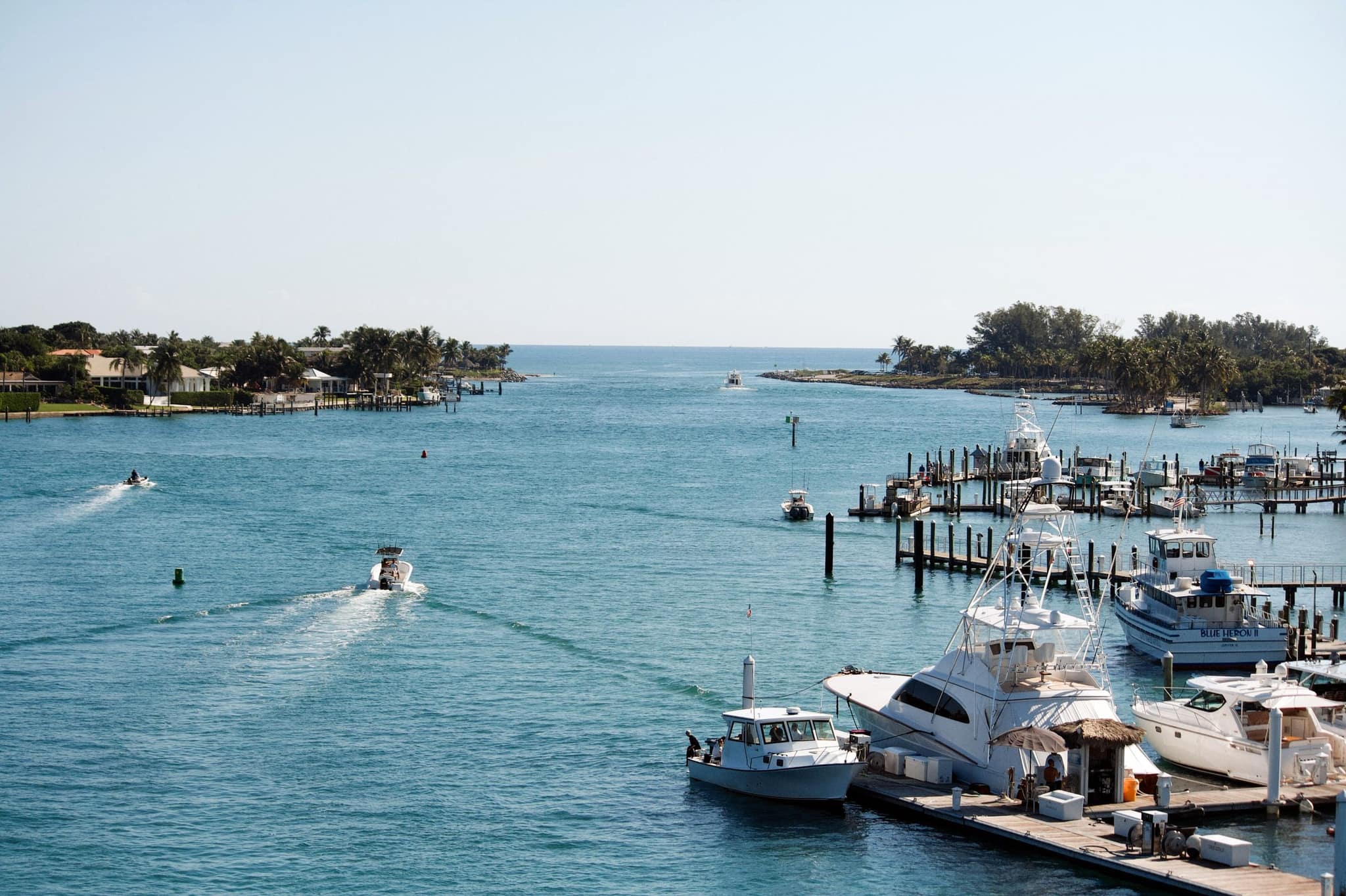 Boats docked on the water at Jupiter Inlet