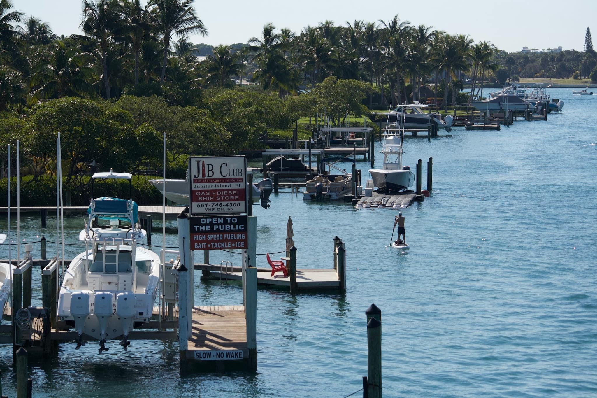 Private docks and a paddle boarder on the Jupiter waterfront